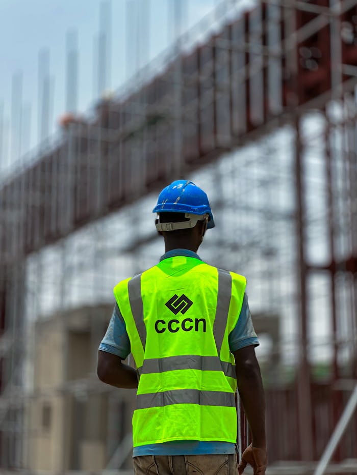 construction-worker-at-building-site-in-safety-gear-32467381